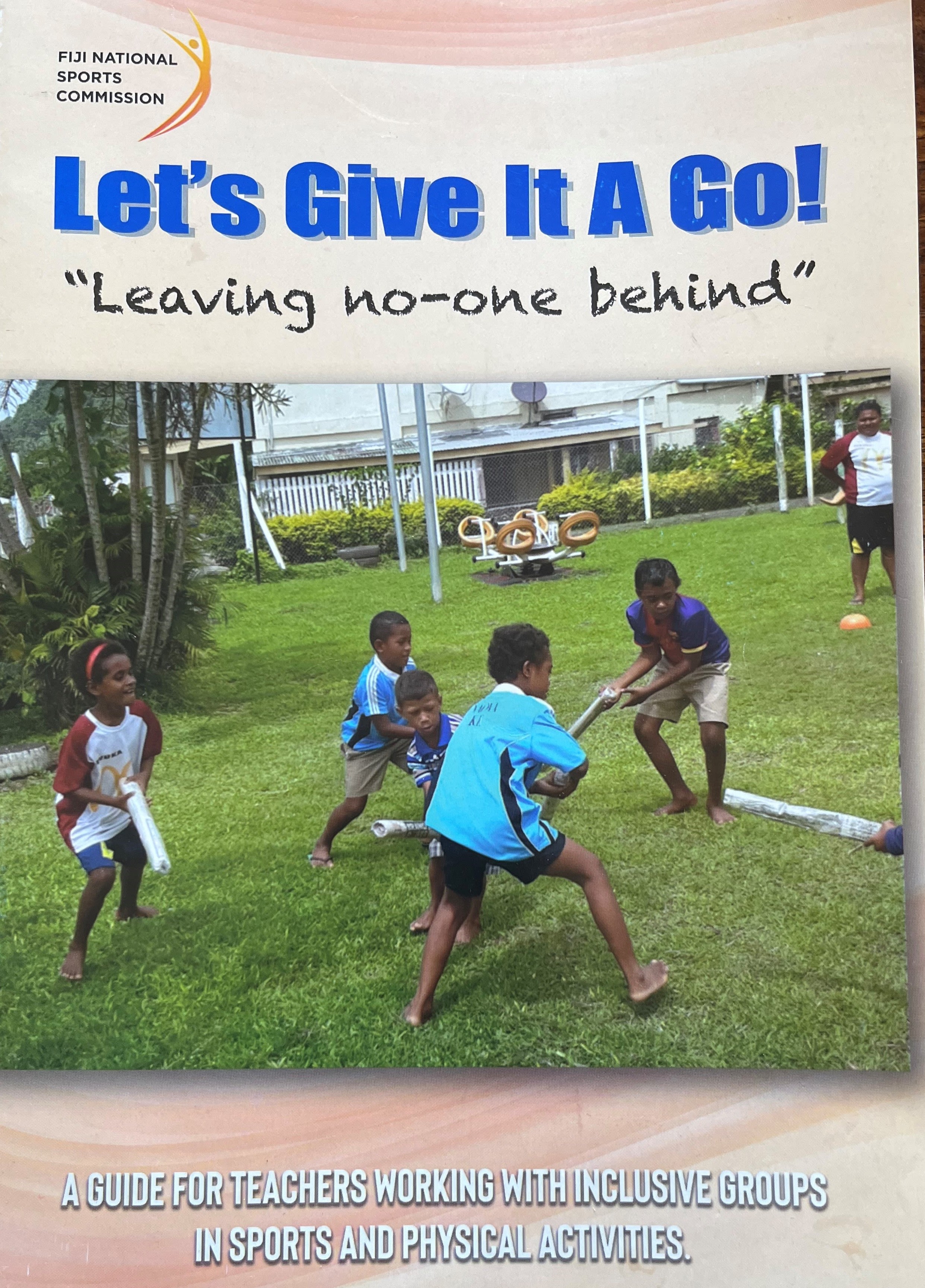 Photo of the cover of the training program title Let's give it a go! Leaving no-one behind' which shows children playing with bats